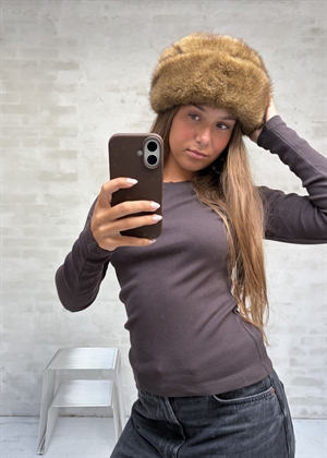 Tyra hat Brown Boii Studios
